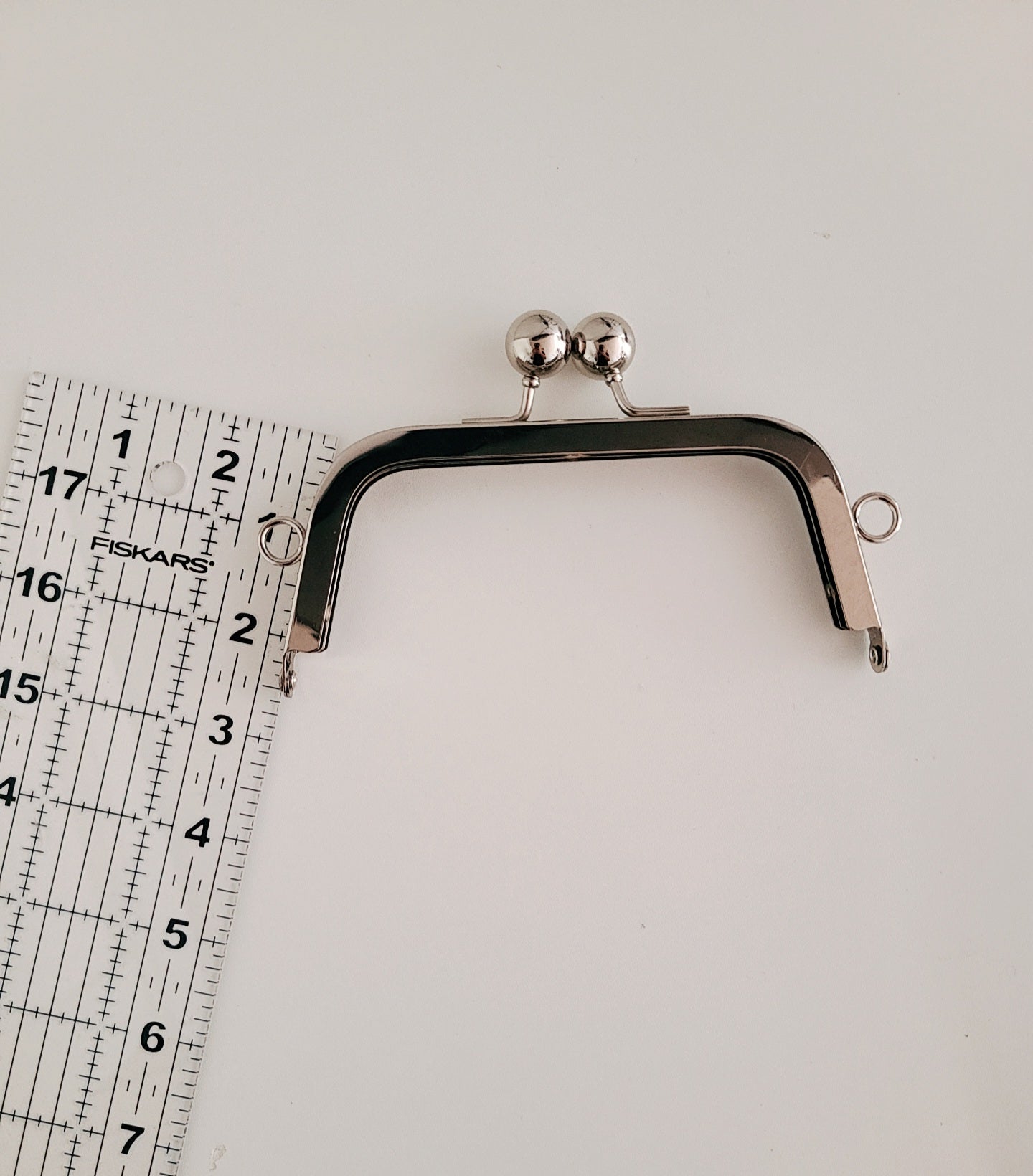 Small clasp frame for bag