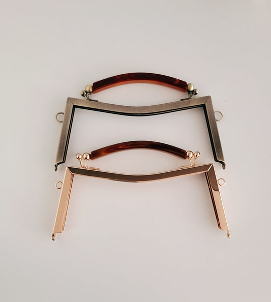 Clasp metal frame for bag making